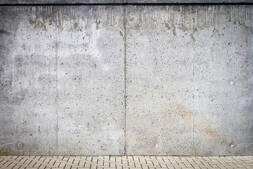 Concrete wall and parking place