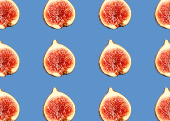 Pattern of cut figs on blue background