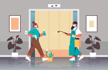 female cleaners in masks disinfecting coronavirus cells in elevator to prevent covid-19 pandemic cleaning service disinfection control of epidemic concept horizontal full length vector illustration