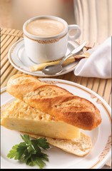 Baguette de tortilla de patata con café con leche, desayuno español. Baguette de tortilla de patata con café con leche, desayuno español.