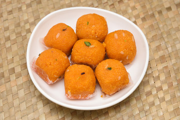 Indian sweet food or diwali sweets Mithai Laddu or Ladoo, Halwa, Milk Peda for celebration in Delhi, India.