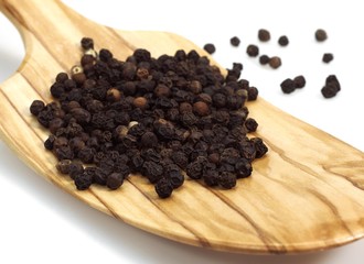 Black Peppercorn, piper nigrum, Black Berries against White Background