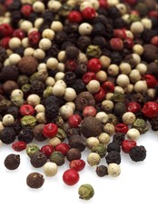 Five Peppercorns, piper nigrum, Black, Green, White, Pink and Jamaica Pepper, Berries against White Background