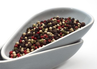 Five Peppercorns, piper nigrum, Black, Green, White, Pink and Jamaica Pepper, Berries against White Background