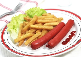 Plate with Sausage and French Fries against White Background