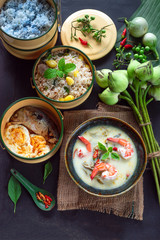 Green curry with shrimp. Thai cuisine with Eight immortals fried rice or Ba Xian fried rice,Mackerel ,lotus,fried egg,. (kang keaw wan) Selective focus