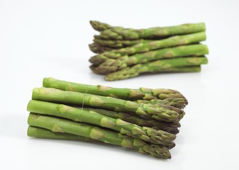 Green Asparagus, asparagus officinalis, Vegetables against White Background