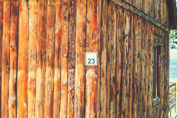 number on a wooden house