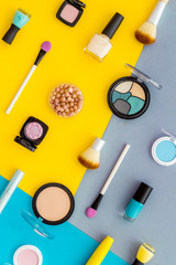 Multicolor pattern of makeup products and colorfull cosmetics. Flat lay top view