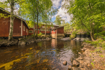Fototapeta na wymiar Old mill in the forest in Finland