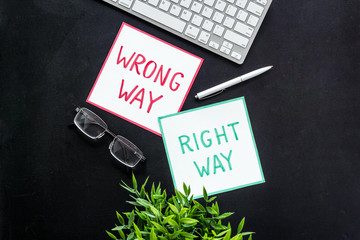 Problem solving. Right and wrong way icons on work desk from above