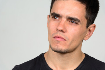 Obraz premium Portrait of handsome man against white background