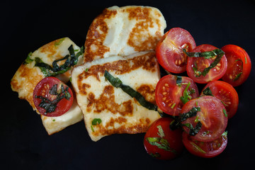 Grilled halloumi cheese with cherry tomatoes