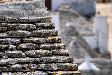 South of the Italy, alberobello with blue sky and the trulli in background