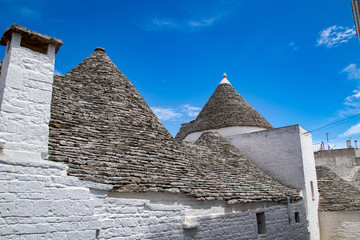 South of the Italy, alberobello with blue sky and the trulli in background