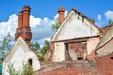 preserved brick chimneys and walls of the XIX century mansion