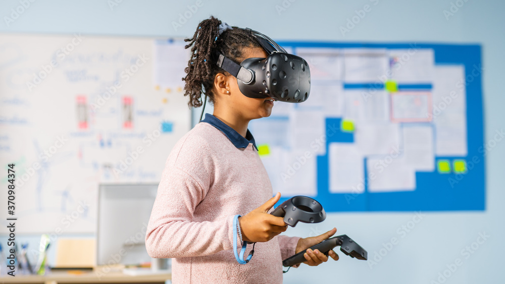 Poster elementary school computer science class: cute girl wearing augmented reality headset and using cont