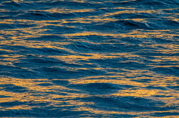 Sunlight reflected on ripples of water