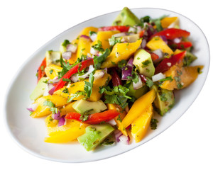 Healthy vegetable salad with mango, avocado