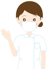 マスクをつけて案内をするナース