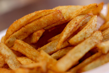 french fries on a white plate