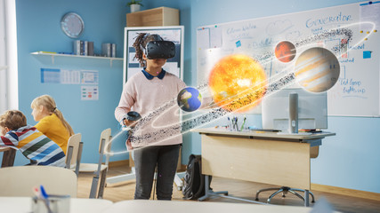 Cute Girl Wearing Augmented Reality Headset and Using Controllers Interacts with 3D Solar System....