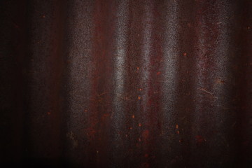 The galvanized sheet is rust, dark brown.