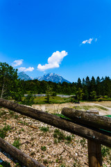 mountain landscape with wooden fence