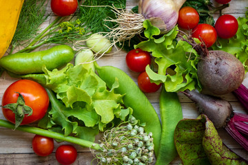 Autumn fresh vegetables on wooden table background