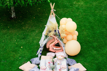 birthday celebration in nature. .indian wigwam on a children's birthday © Игорь Гончаров