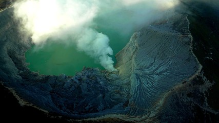 A top view inside a volcano which is erupting in the Java island in Indonesia © Shenzen Photo Lab