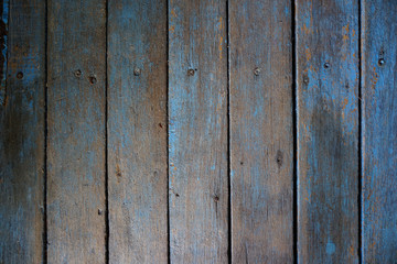 Obraz premium Wooden floor blue color the construction dirty background with daylight on the floor