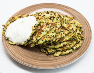 fried zucchini pancakes with greek yogurt