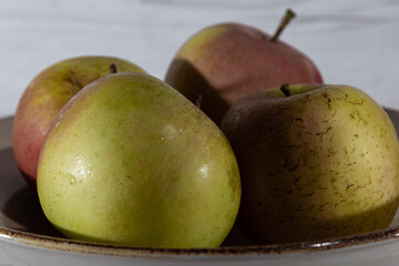 green apples in a white table