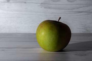 green apples in a white table