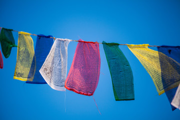Some buddhist prayer flags, flying in the wind in Kathmandu, Nepal