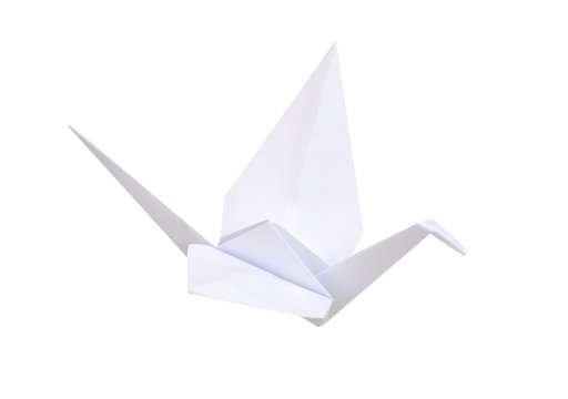 A white origami Crane isolated white