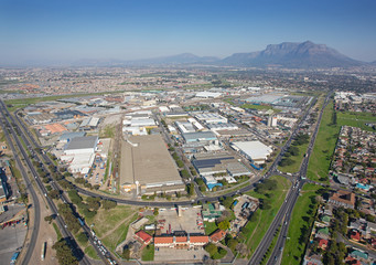 Cape Town, Western Cape / South Africa - 07/24/2020: Aerial photo of Epping with Table Mountain in the background