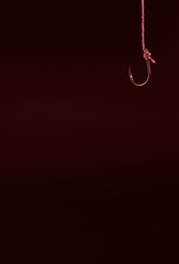 Hook on red black background