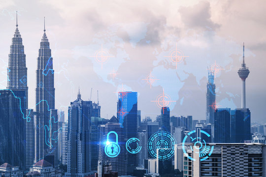 World planet Earth map hologram over panorama city view of Kuala Lumpur, Malaysia, Asia. The concept of international connections and business. Multi Exposure.