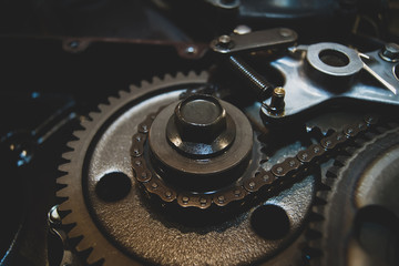 Motorcycle engine mechanism close-up. Soft selective focus.