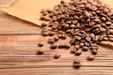 Fototapeta na wymiar coffee beans on a colored background. Place to insert text, minimalism 