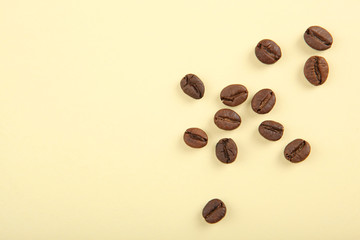 coffee beans on a colored background. Place to insert text, minimalism
