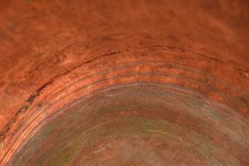 Obraz premium Concave copper surface. Oxidation of copper. Copy space.
