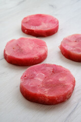 Fresh raw round tuna cutlet