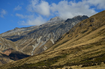 Mountain and farm on scenic road Queenstown New Zealand