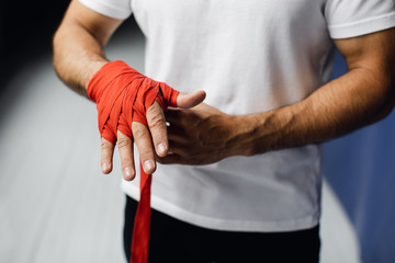 boxer prepare for a fight. Young boxer in white t-shirt