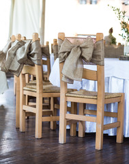 Obraz na płótnie Canvas wooden chairs in a restaurant
