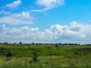 photo of a Russian large field above a cloudy sky