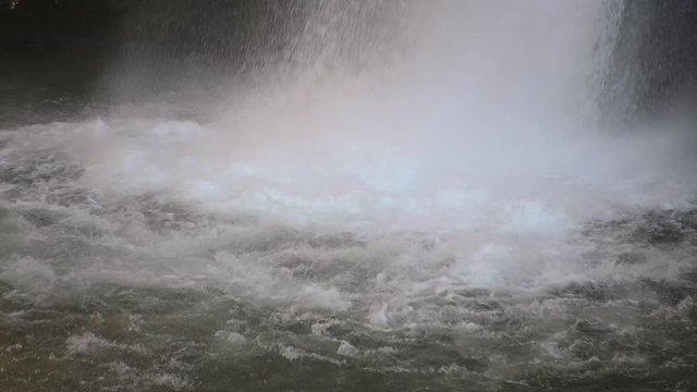 Pristine waterfall base. Spray at the base of the beautiful Savica waterfall in Slovenia. Close up, static shot, real time